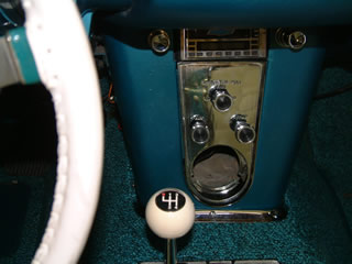 Center console with the fan switch, temperature adjuster, airflow control and missing clock (due to needed repairs).